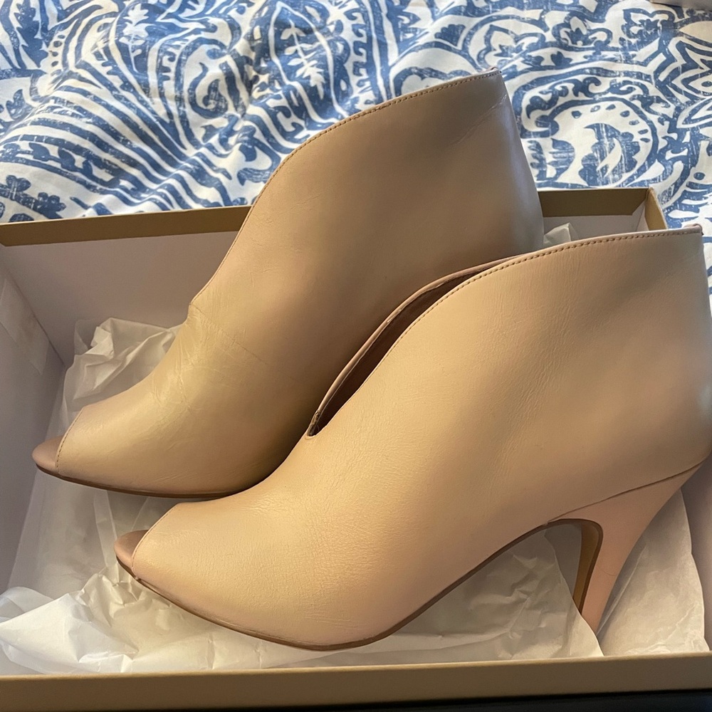 Beautiful heeled booties in lovely nude color- never worn!